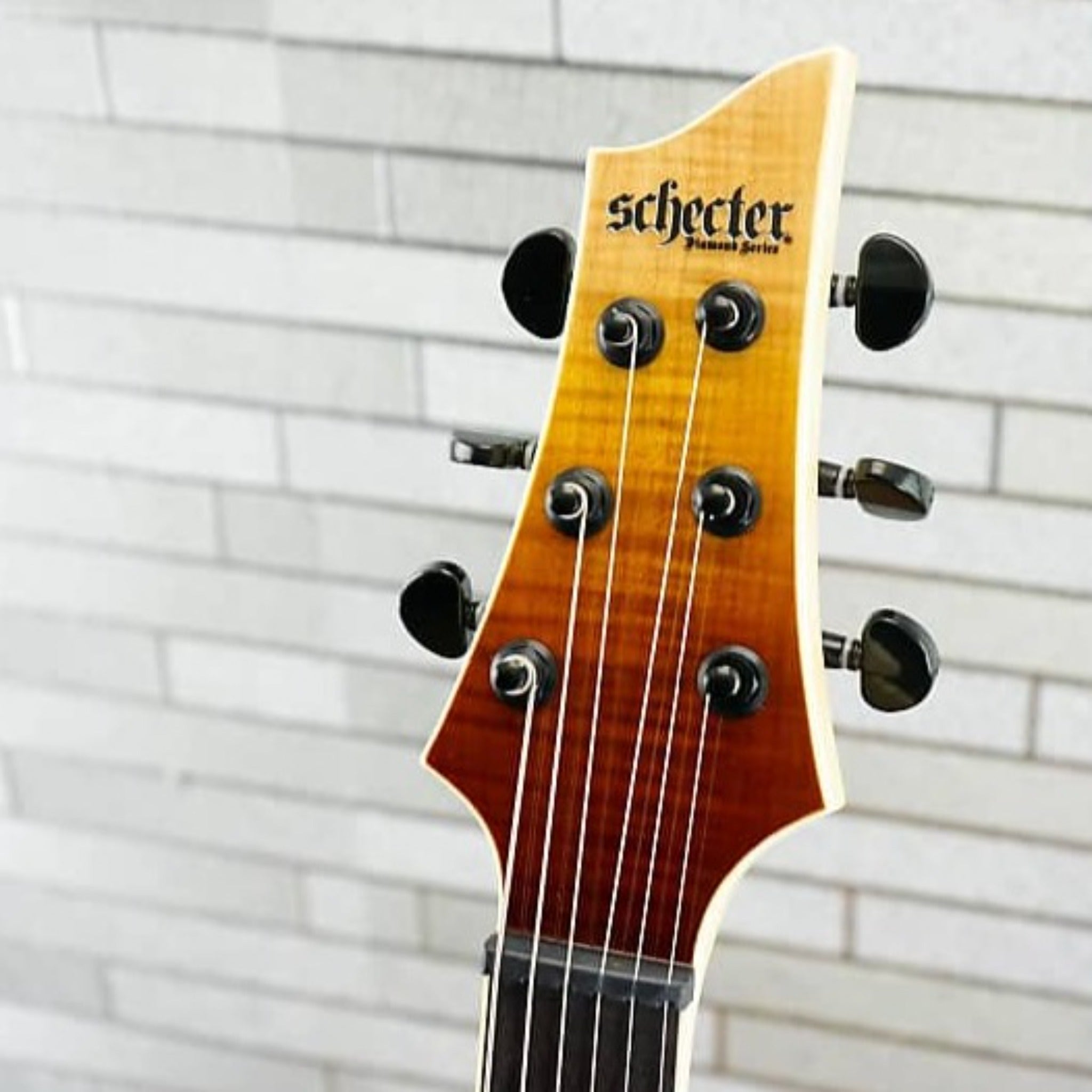 Guitarra eléctrica Schecter C-7 SLS Elite 7 Cuerdas Antique Fade Burst